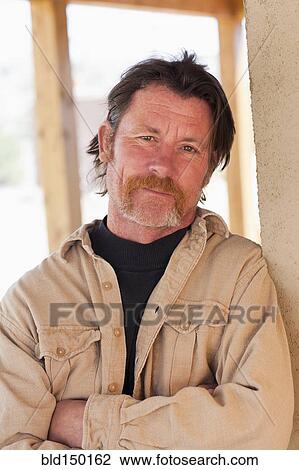 Stock Image - Serious Caucasian man. Fotosearch