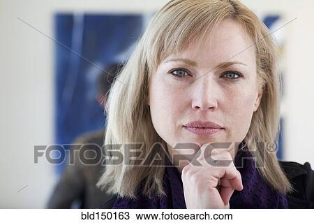 Stock Image - Serious Caucasian woman. Fotosearch