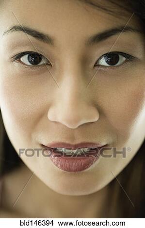 Serious Chinese woman View Large Photo Image Picture - Serious Chinese woman. Fotosearch
