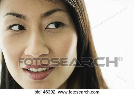 Stock Image - Serious Chinese woman. Fotosearch
