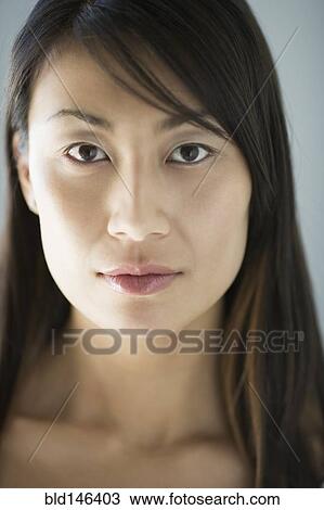 Stock Image - Serious Chinese woman. Fotosearch