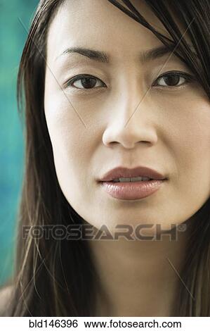 Serious Chinese woman View Large Photo Image Stock Photograph - Serious Chinese woman. Fotosearch