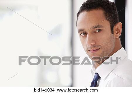 Serious Hispanic businessman View Large Photo Image Picture - Serious Hispanic businessman. Fotosearch