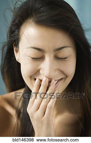 Shy Chinese woman View Large Photo Image Stock Photo - Shy Chinese woman. Fotosearch