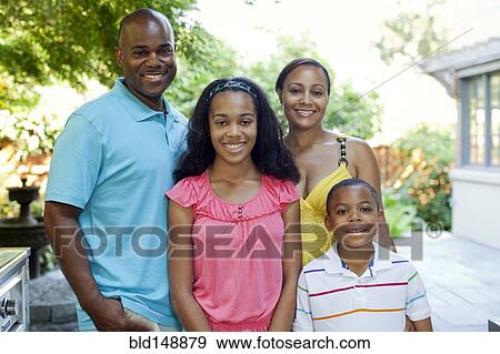 Stock Photo - Smiling African American family. Fotosearch