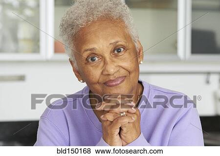 Smiling African American woman View Large Photo Image Stock Photo - Smiling African American woman. Fotosearch