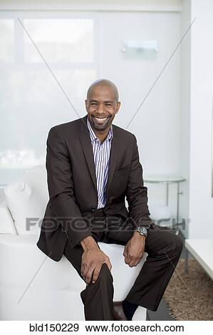 Smiling Black businessman View Large Photo Image Stock Photo - Smiling Black businessman. Fotosearch