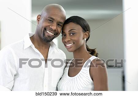 Smiling Black couple View Large Photo Image Stock Photo - Smiling Black couple. Fotosearch