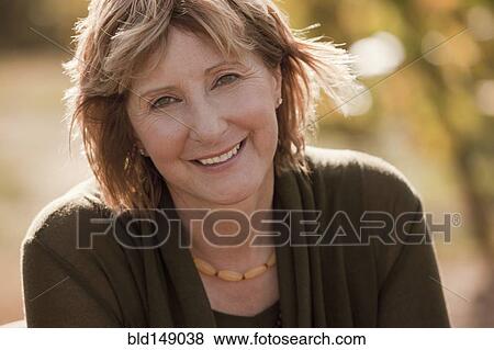 Stock Photo - Smiling Caucasian woman. Fotosearch