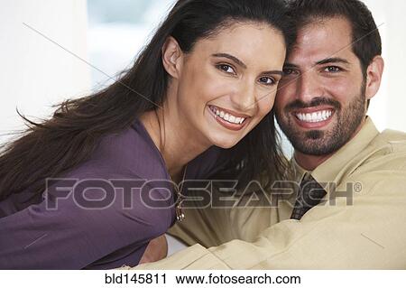 Stock Image - Smiling Hispanic couple. Fotosearch