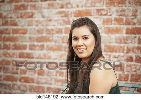 Stock Image - Smiling Hispanic woman. Fotosearch