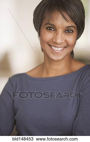 Stock Image - Smiling Native American woman. Fotosearch