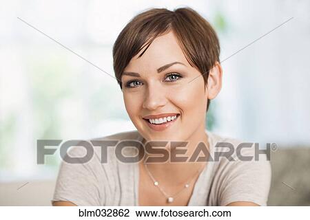 Stock Image - Caucasian woman smiling. Fotosearch