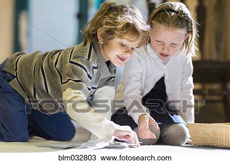 Children working together on floor in classroom View Large Photo Image Stock Image - Children working together on floor in classroom. Fotosearch
