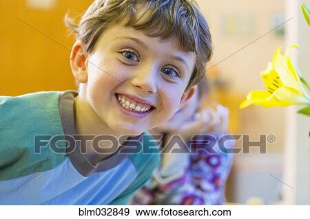 Stock Photo - Close up of boy smiling. Fotosearch