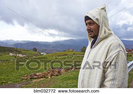 Man wearing sweater in rural field View Large Photo Image Stock Image - Man wearing sweater in rural field. Fotosearch
