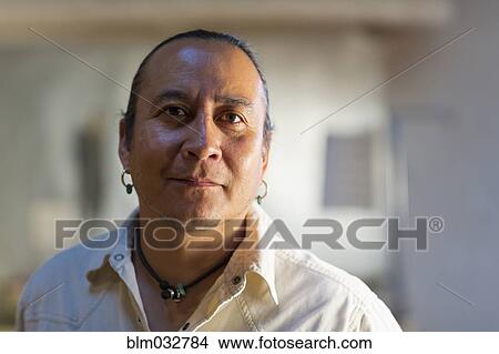 Native American man smiling indoors View Large Photo Image Picture - Native American man smiling indoors. Fotosearch