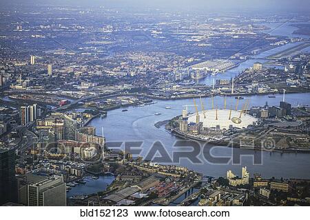 Stock Image - "Aerial view of London cityscape and river, England". Fotosearch