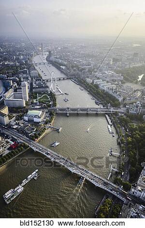 Stock Image - "Aerial view of London cityscape and river, England". Fotosearch