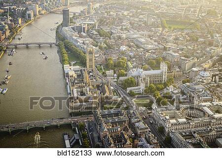 Stock Image - "Aerial view of London cityscape and river, England". Fotosearch