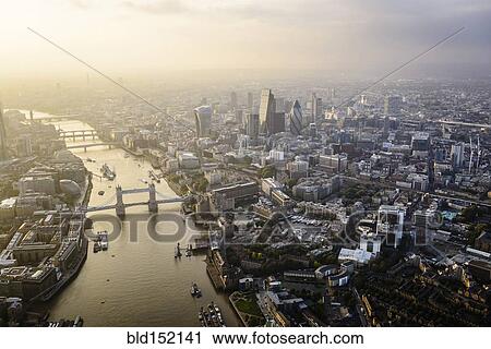 Stock Image - "Aerial view of London cityscape and river, England". Fotosearch