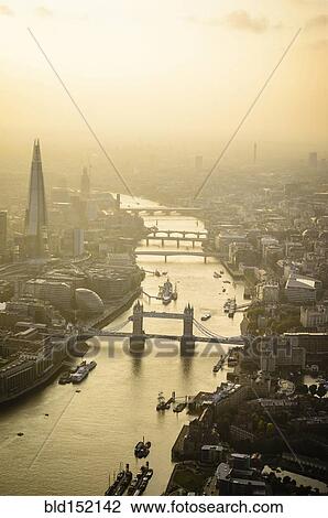 Stock Image - "Aerial view of London cityscape and river, England". Fotosearch