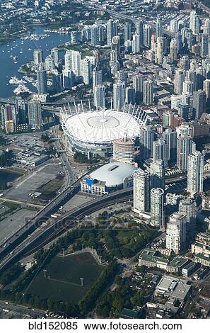 Stock Photography - "Aerial view of stadium in Vancouver cityscape, British Columbia, Canada". Fotosearch