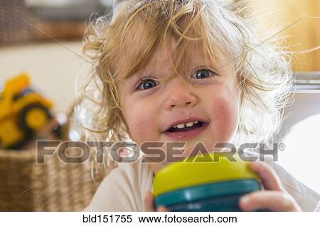 Caucasian baby holding cup View Large Photo Image Stock Photography - Caucasian baby holding cup. Fotosearch