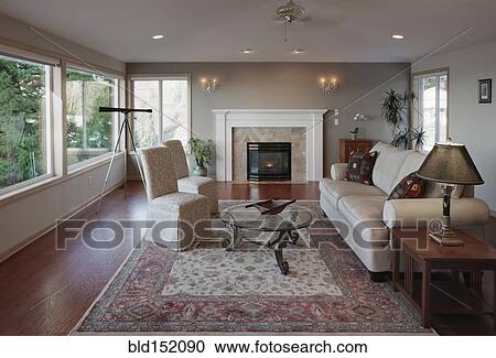 Stock Image - "Chairs, sofa and coffee table in living room". Fotosearch