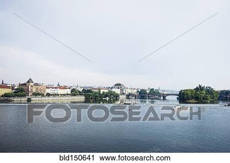 Stock Image - "Cityscape and waterfront, Prague, Czech Republic". Fotosearch