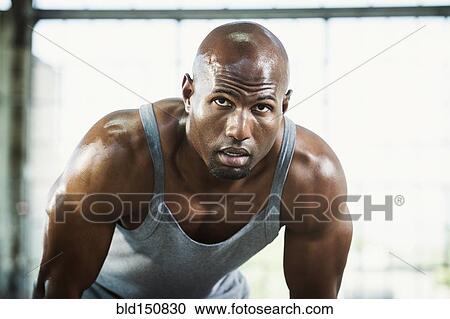 Close up of Black athlete resting View Large Photo Image Stock Image - Close up of Black athlete resting. Fotosearch