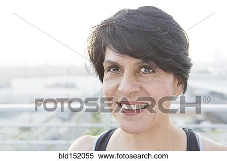 Close up of mixed race woman smiling View Large Photo Image Stock Photography - Close up of mixed race woman smiling. Fotosearch