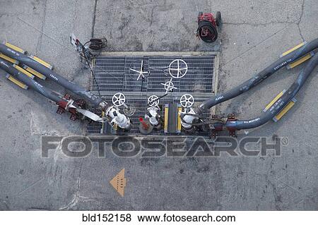 Close up of oil pumping valves View Large Photo Image Stock Photo - Close up of oil pumping valves. Fotosearch