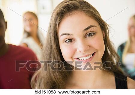 Close up of smiling face of teenage girl View Large Photo Image Stock Photo - Close up of smiling face of teenage girl. Fotosearch