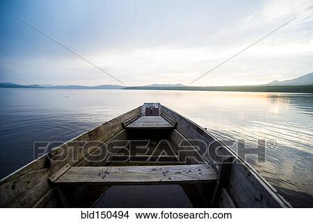 Dilapidated boat on remote lake View Large Photo Image Picture - Dilapidated boat on remote lake. Fotosearch