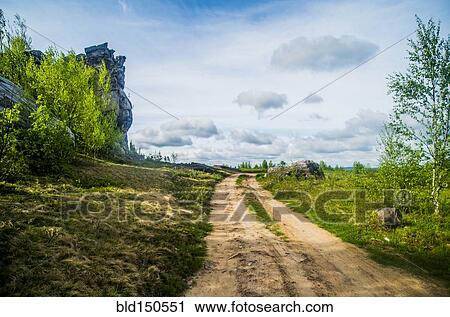 Dirt path in rural meadow View Large Photo Image Stock Image - Dirt path in rural meadow. Fotosearch