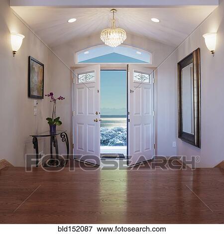 Stock Photo - Doors opening to ocean waves. Fotosearch