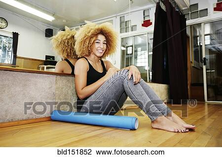 Hispanic dancer sitting in studio View Large Photo Image Stock Image - Hispanic dancer sitting in studio. Fotosearch