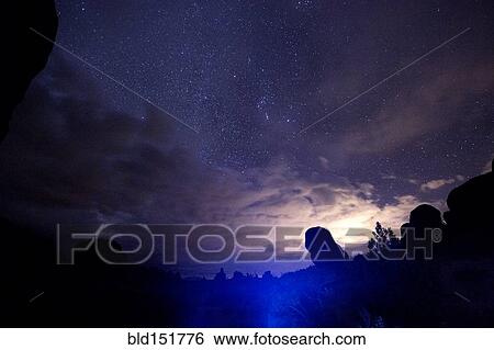 "Illuminated rocks at night in Arches National Park, Moab, Utah, United States" View Large Photo Image Stock Photograph - "Illuminated rocks at night in Arches National Park, Moab, Utah, United States". Fotosearch