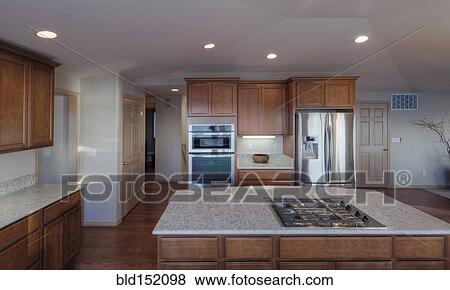 Stock Photo - Island in open kitchen area. Fotosearch