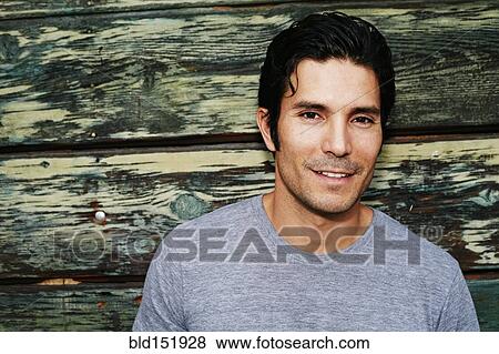 Stock Photo - Mixed race man smiling. Fotosearch