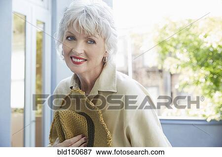 Older Caucasian woman smiling outdoors View Large Photo Image Stock Photo - Older Caucasian woman smiling outdoors. Fotosearch