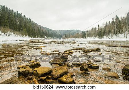 Rocks in remote river View Large Photo Image Picture - Rocks in remote river. Fotosearch
