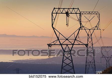 Silhouette of power lines at sunset View Large Photo Image Stock Photography - Silhouette of power lines at sunset. Fotosearch