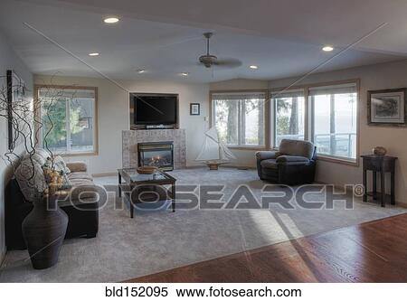 "Television, sofa and coffee table in living room" View Large Photo Image Stock Photography - "Television, sofa and coffee table in living room". Fotosearch