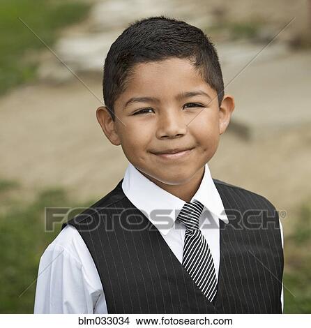 Picture - Hispanic boy wearing formal attire. Fotosearch