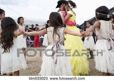Hispanic community dancing at quinceanera View Large Photo Image Stock Image - Hispanic community dancing at quinceanera. Fotosearch