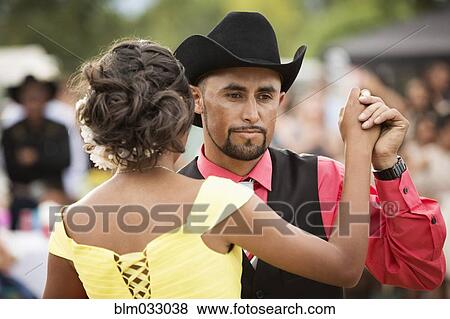 Stock Photo - Hispanic father dancing with daughter at quinceanera. Fotosearch