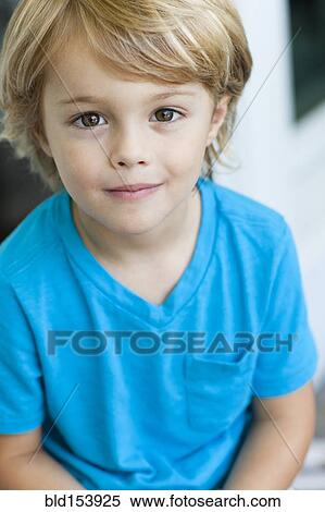 Stock Photography - Caucasian boy smiling outdoors. Fotosearch