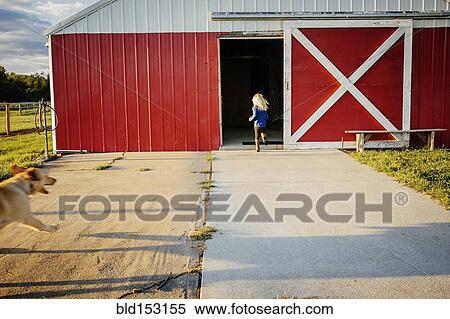 Caucasian girl running to barn on farm View Large Photo Image Stock Photography - Caucasian girl running to barn on farm. Fotosearch